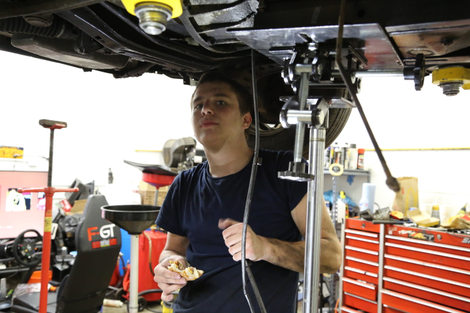 Mathias under his formerly automatic E30.